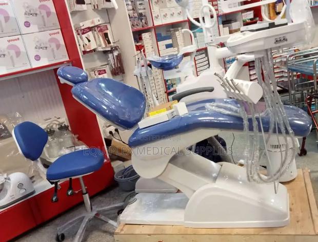 Blue Modern Dental Chair With Compressor and Teeth Whitening Machine - main view
