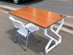 Brown Office Desk With White Metal Frame and Folding Chair