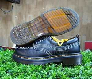 The Dr. Martens Lowell Black Analine Moc Toe Shoe