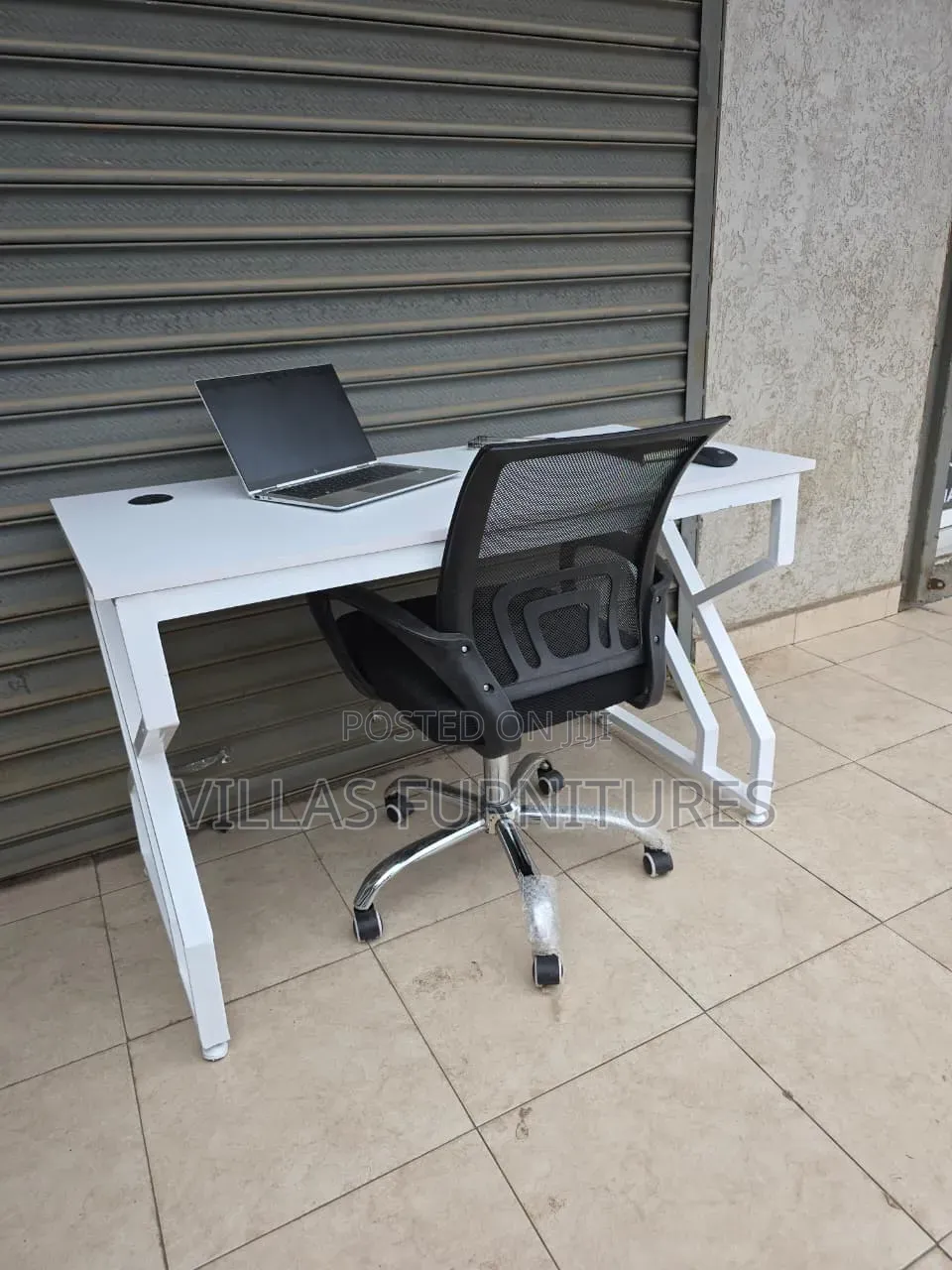 All White Table and Rolling Mesh Chair