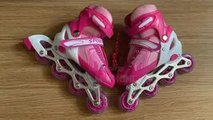 Adjustable Kids' Inline Skates With a Hard-Boot Structure