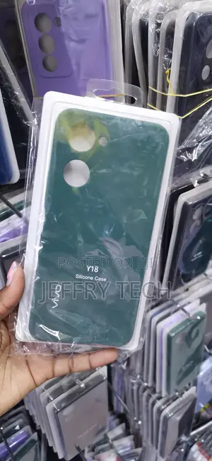 Green Vivo Y18 Silicone Case Packed a Clear Plastic Protective Case.