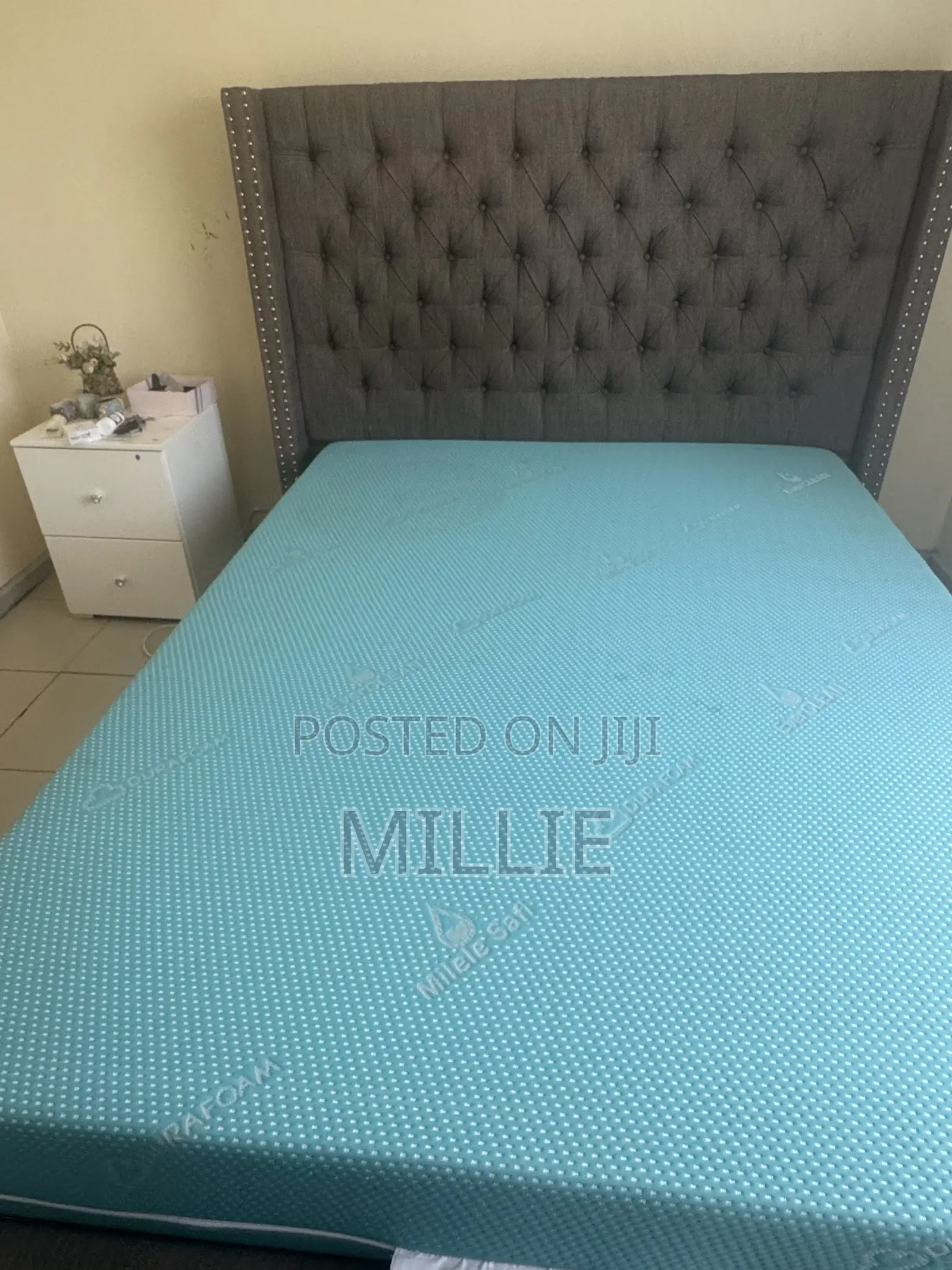 Odds and Ends Tufted Bed.