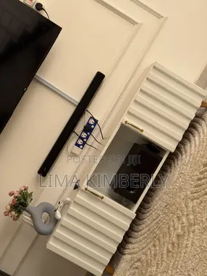TV Stand Which Is White and a 4 by 6 With Drawers