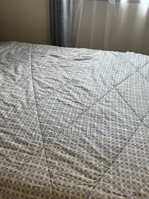 Cotton Duvet Plus a Bedsheet and Two Pillow Cases