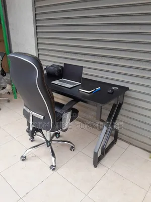 Black Leather Chairs and Black Desk