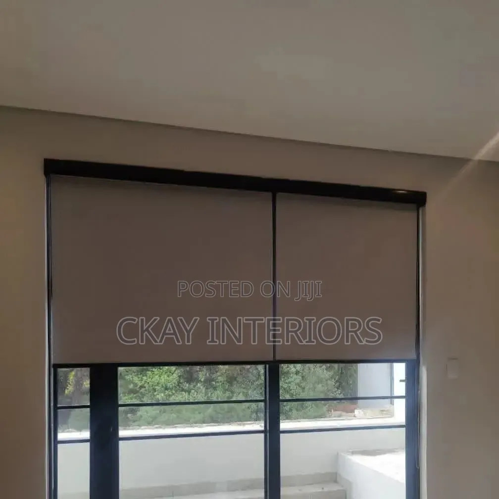 Enhance Your Room's Appearance With Brown and White Roller Blinds