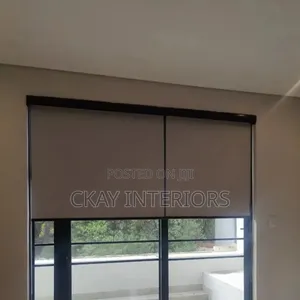 Enhance Your Room's Appearance With Brown and White Roller Blinds