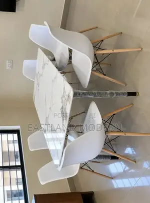 6 Seater Marble Dining Table Set With White Eames Chairs