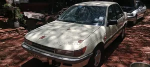 Mitsubishi Lancer 1990 Beige