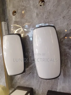 LED Resin Wall Light in Black With White Polycarbonate Diffuser