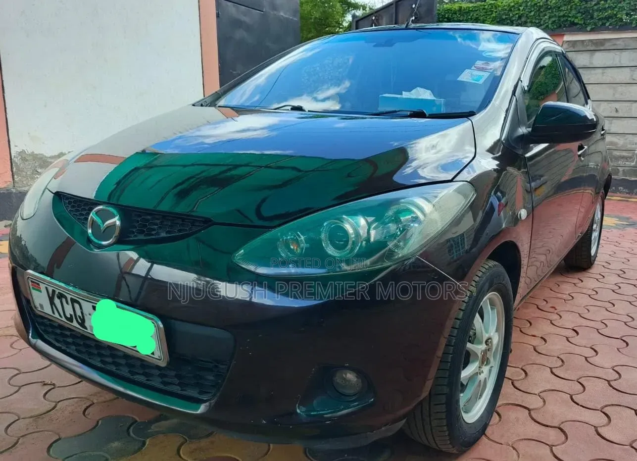 Mazda Demio 2011 Brown