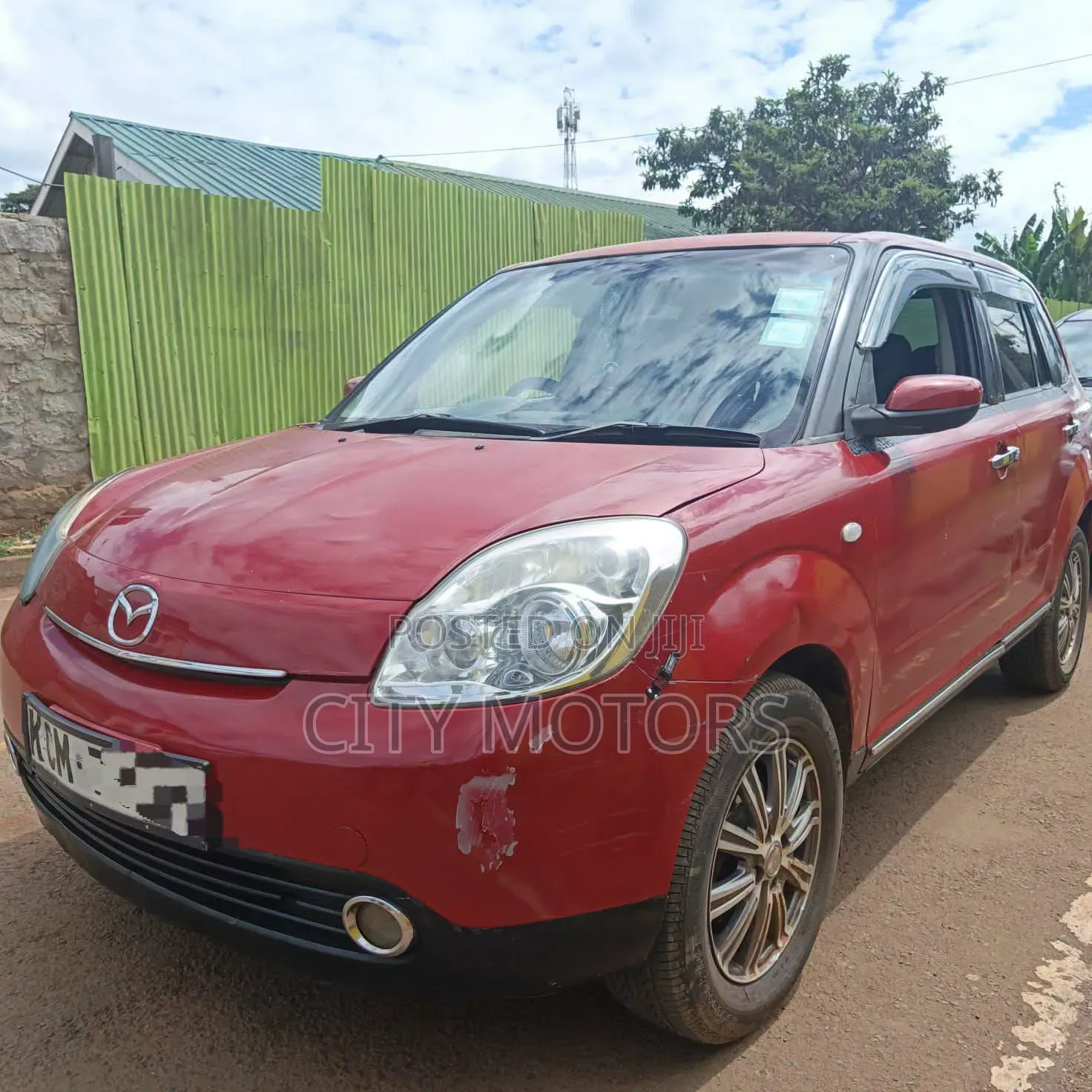 Mazda Verisa 2010 Red