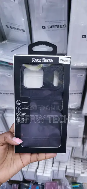 Black Rugged Shield TPU/Hard Case as "New Case" With a "17 PRO MAX"