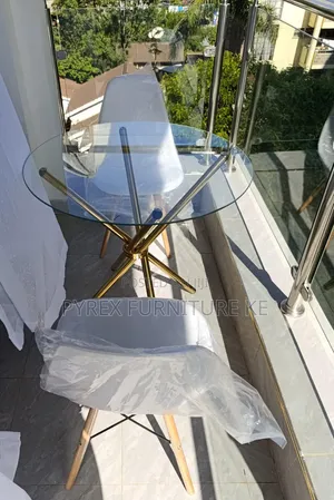 Cafe Table Plus Eames Chair
