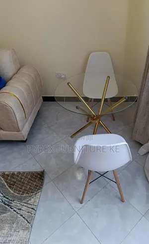 Round Dining Set and 2 White Eames Chairs