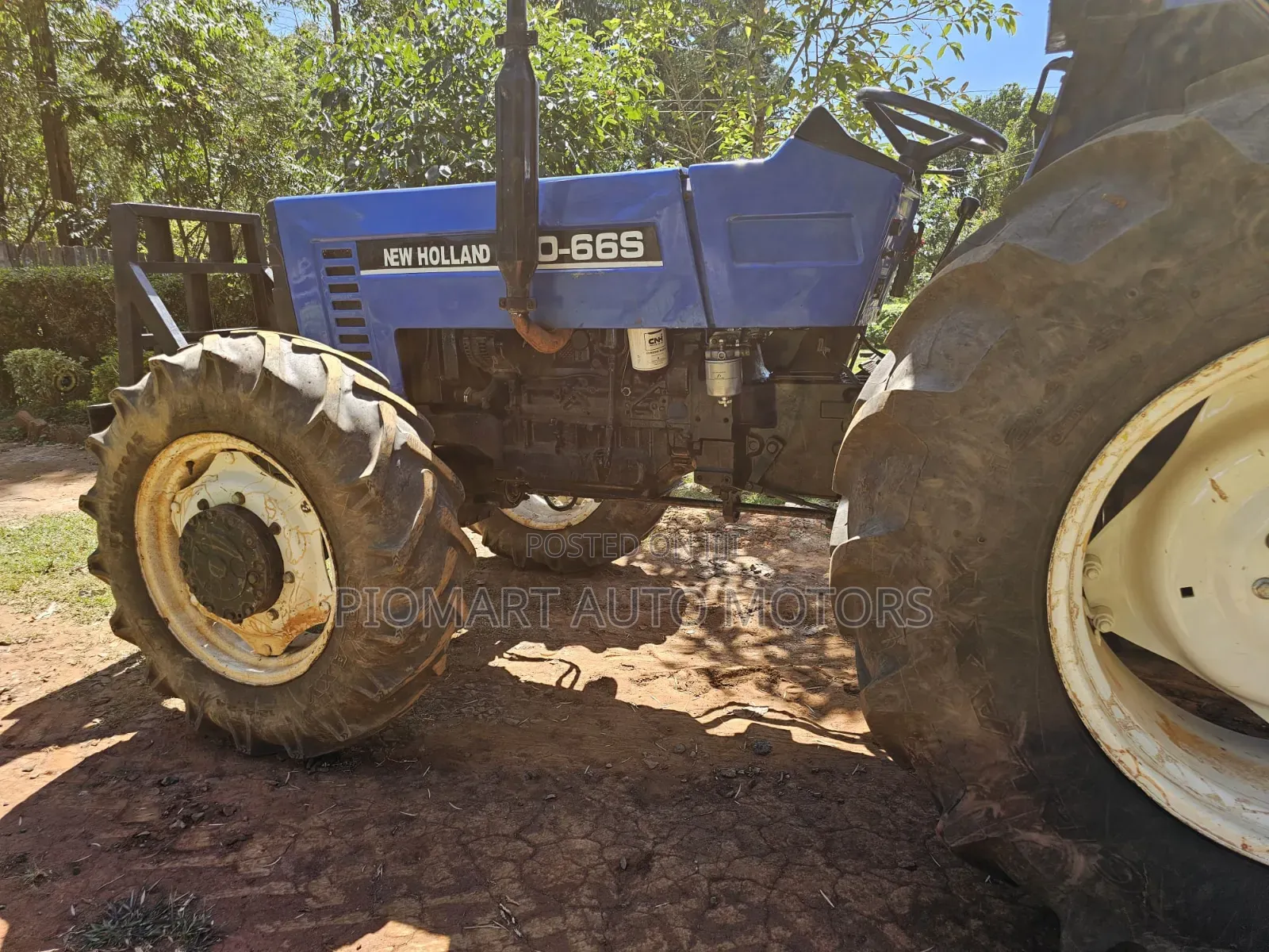 Tractor Newholland 80-66 Four Wheel Blue