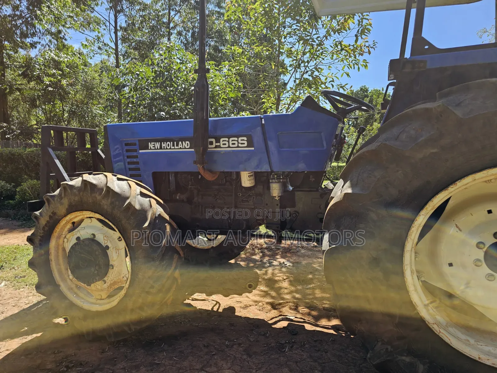 Tractor Newholland 80-66 Four Wheel Blue