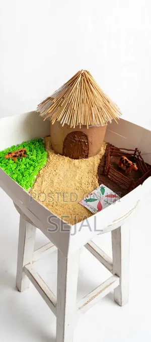 African Homestead Cake With Cows