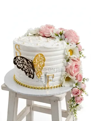 Elegant Pink & White Engagement Cake With Gold Details