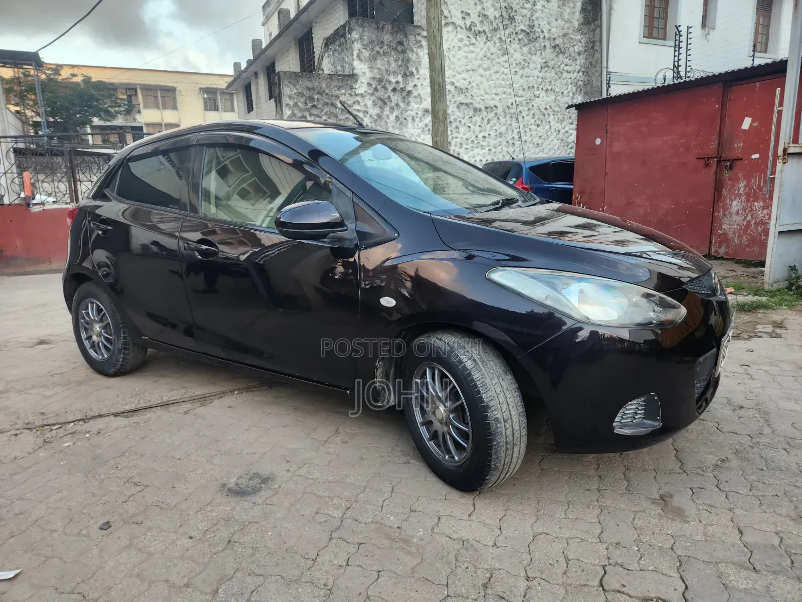 Mazda Demio 2009 Maroon