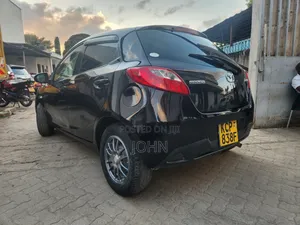 Mazda Demio 2009 Maroon