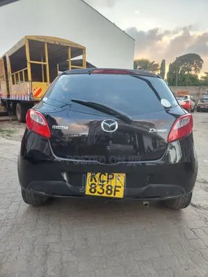Mazda Demio 2009 Maroon