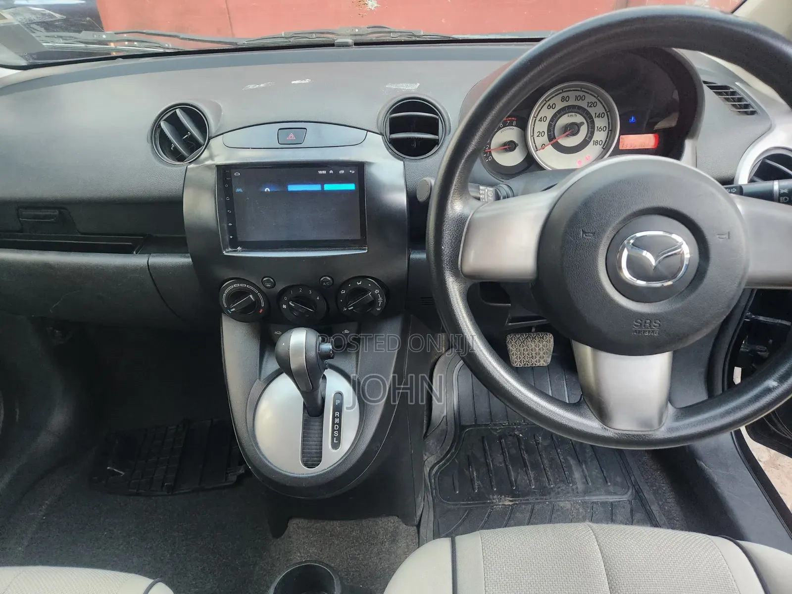 Mazda Demio 2009 Maroon