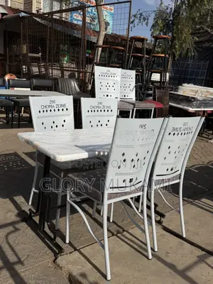 White Marble Table and Coated Restaurant Chairs