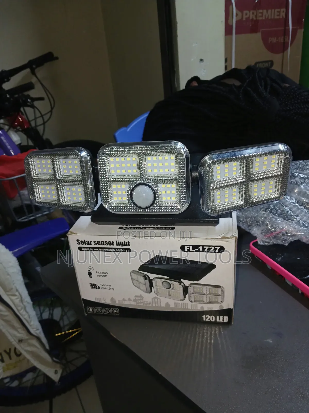 120 LED 3-Head Solar Motion Sensor Light (Model FL-1727).