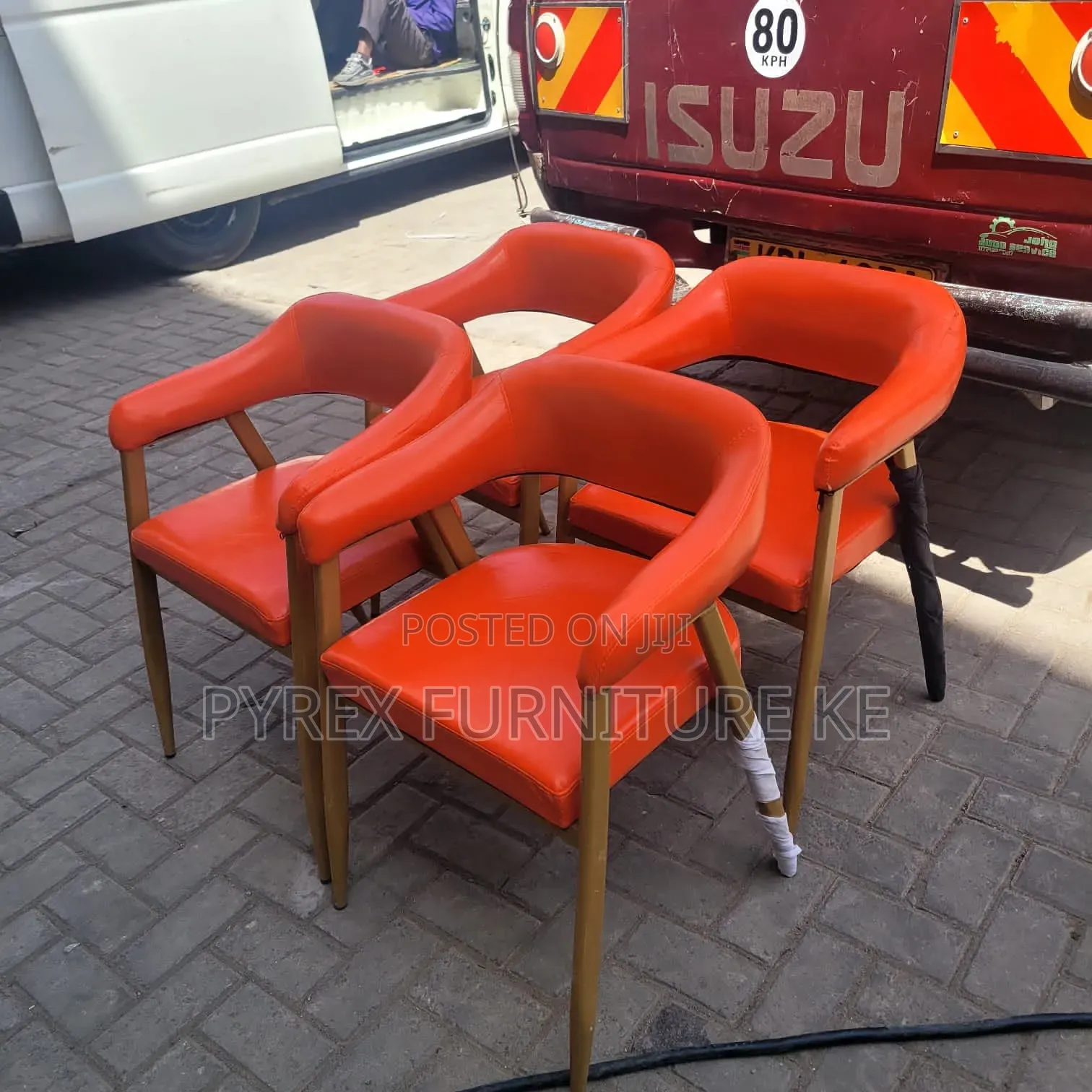 Orange Leatherette Armchairs With Gold Legs