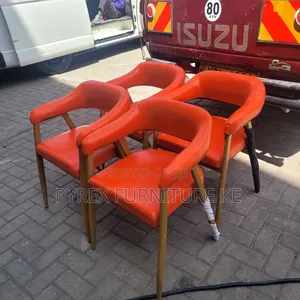 Orange Leatherette Armchairs With Gold Legs