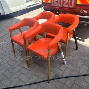 Orange Leatherette Armchairs With Gold Legs