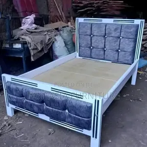 4 by 6 White and Grey Bed.