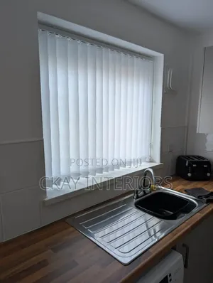 Design Perspective to Your Window Spaces With Vertical Blinds