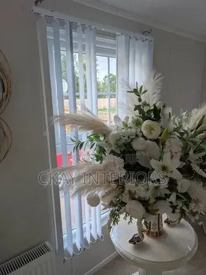 Give Your Living Room a More Tailored Appearance With Vertical Blinds