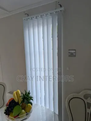 Make Your Glass Partition Look Organised and Elegant by Vertical Blind