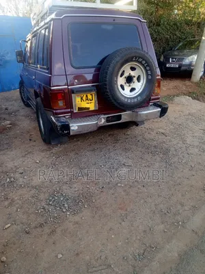 Mitsubishi Pajero Junior 1997 Maroon