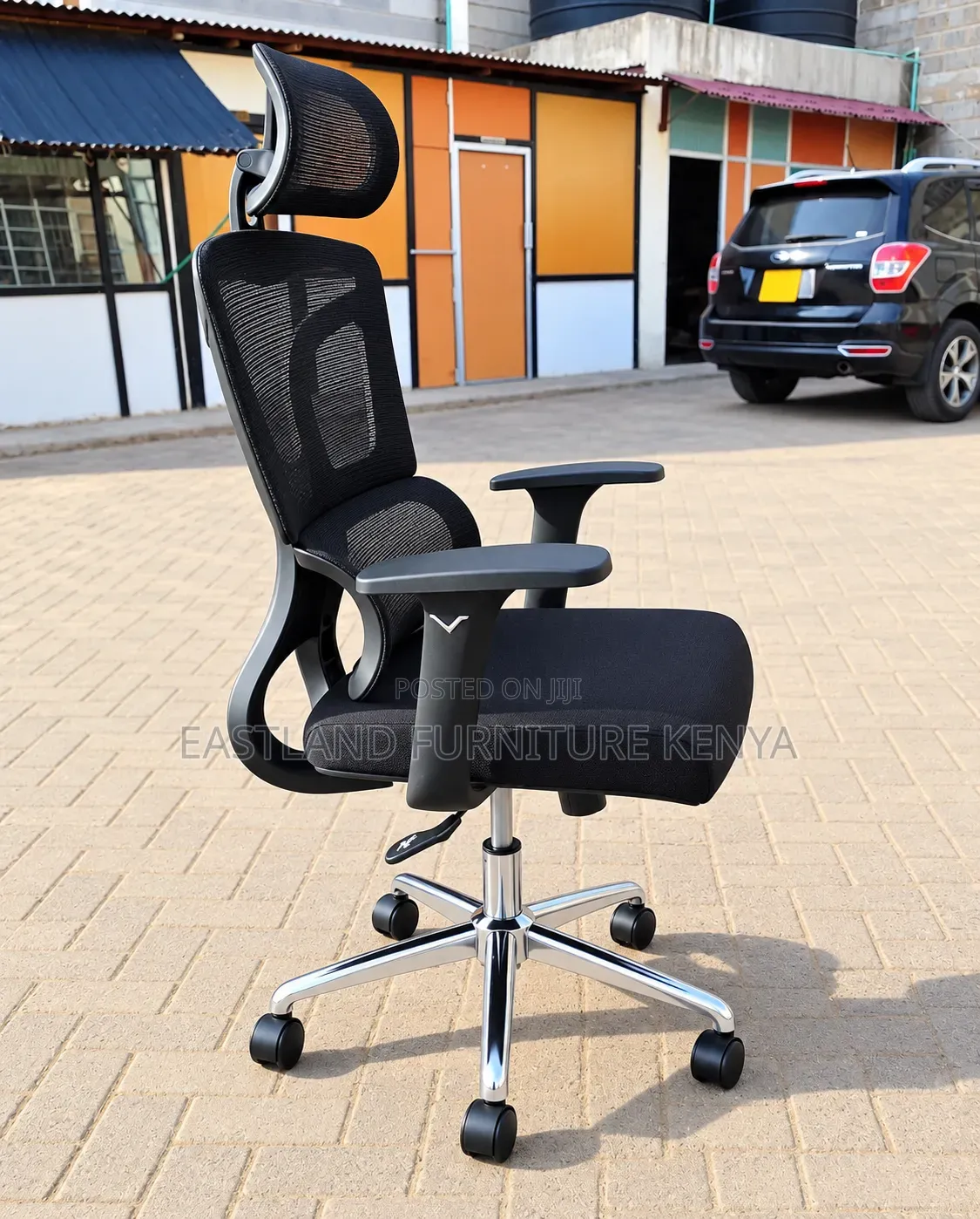 Black Ergonomic Mesh Office Chair With Headrest and Adjustable Armrest
