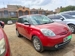 Mazda Verisa 2010 Red