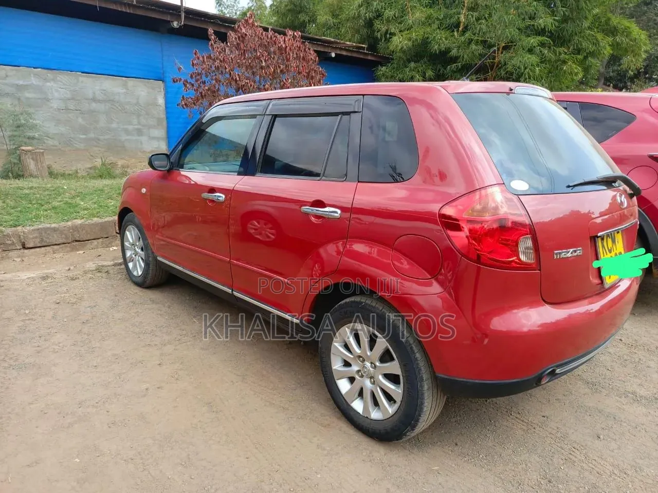 Mazda Verisa 2010 Red