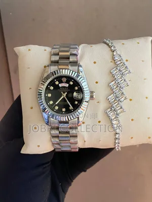 Silver Strapped Ladies Rolex Watch X Bracelet