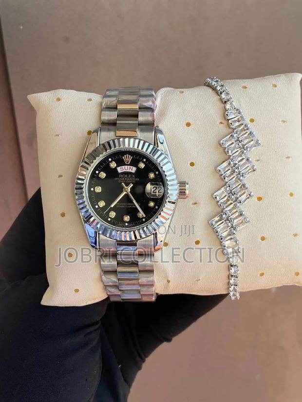 Silver Strapped Ladies Rolex Watch X Bracelet
