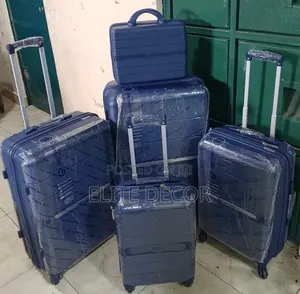 Goodpartner 4-in-1 Unbreakable Rubber Suitcase and Briefcase Set.