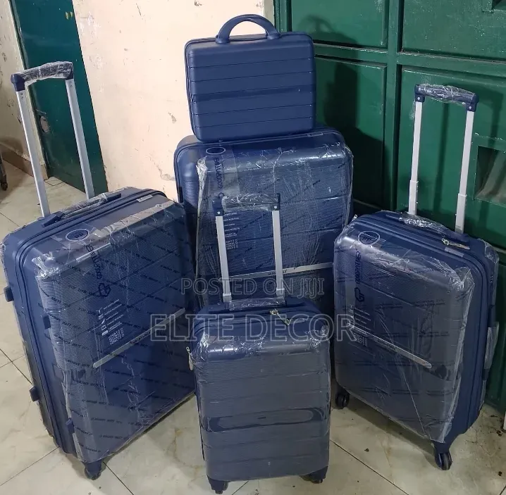Goodpartner 4-in-1 Unbreakable Rubber Suitcase and Briefcase Set.