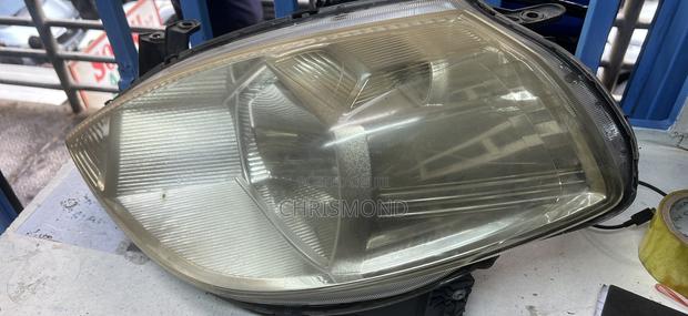 Nissan Tiida 2008 Headlight - main view