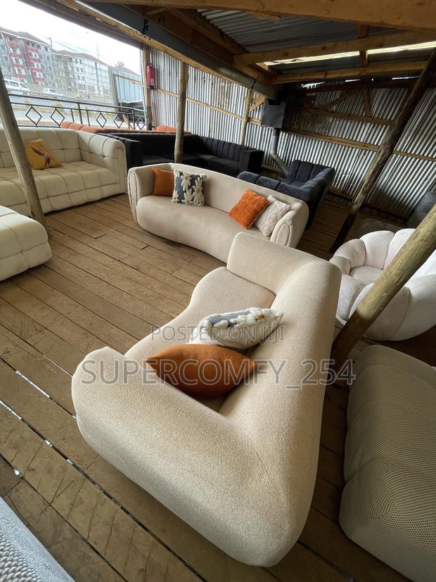 A Neo Modern Fancy Curved Five Seater Sofa - main view
