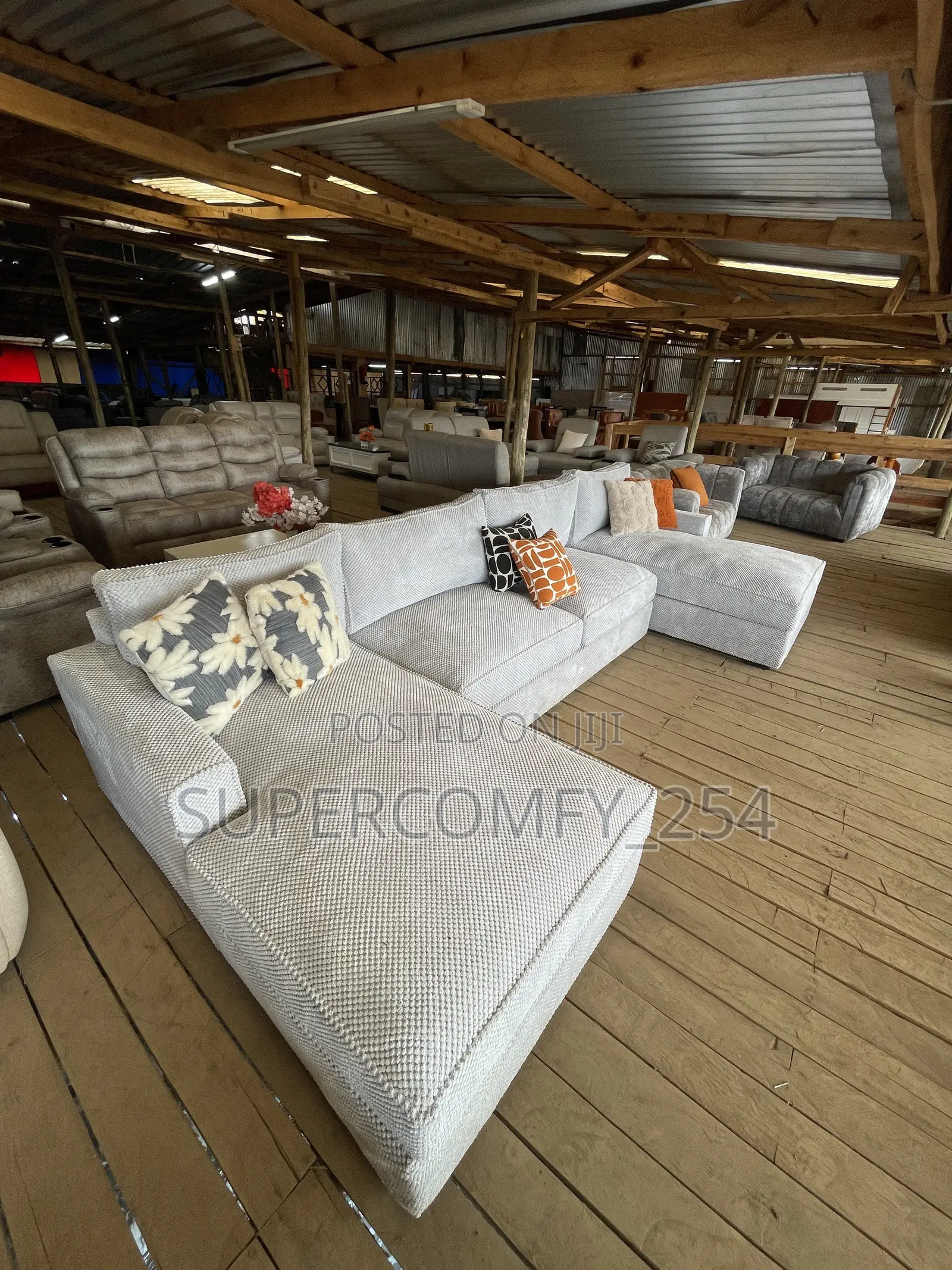 A Massive Bulky Nine Seater U Shape Couch