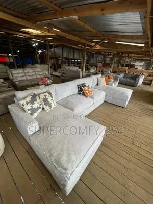 A Massive Bulky Nine Seater U Shape Couch
