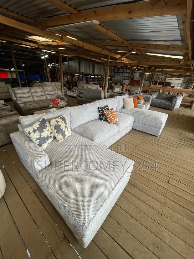 A Massive Bulky Nine Seater U Shape Couch - main view